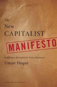 The book cover for "The New Capitalist Manifesto" by Umair Haque features a brown, textured background with bold, white and red text. The subtitle reads, "Building a Disruptively Better Business," with "Manifesto" stamped in red across the center, emphasizing principles of constructive capitalism.